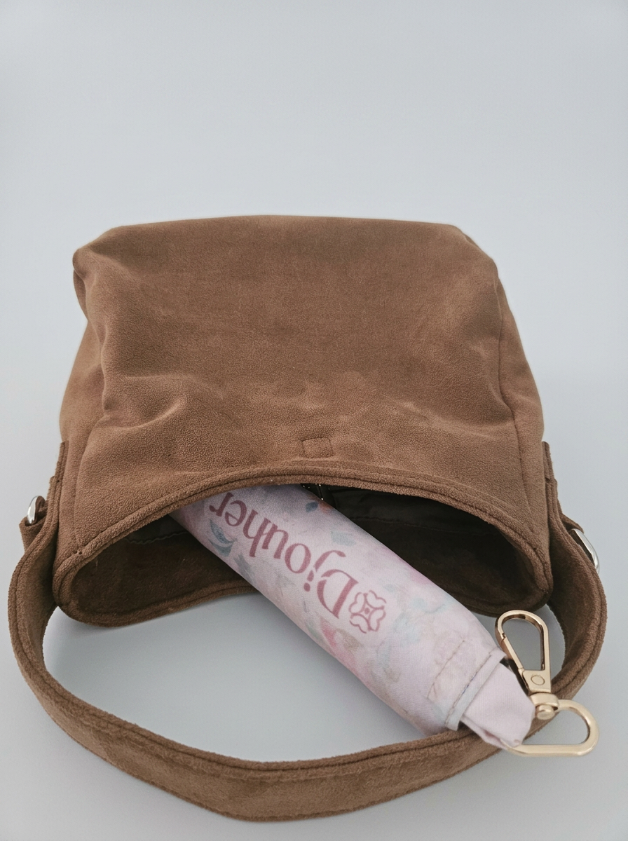 tapis de prière de poche dans un sac à main